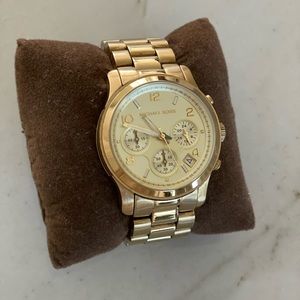 Gold Michael Korda watch